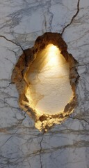 Oval cutout in white marble, lit from within