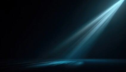 Teal light beams illuminating a dark stage