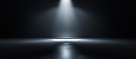 Empty stage lit by spotlight (1)