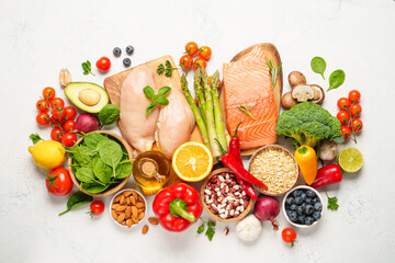Healthy food assortment on white background.