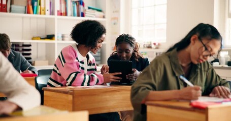 Tablet, happy and students in classroom at school with networking, social media or app together. Digital technology, bonding and girl teenagers with online contact, connection or research at academy. - Powered by Adobe