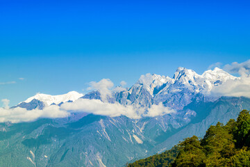 Fototapeta premium Beautiful view of Himalayan mountains at Ravangla, Sikkim. Himalaya is the great mountain range in Asia with more than 50 peaks , mostly highest, including mount Everest the highest in the world.