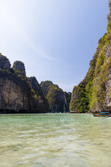 Many fishing boat with tourists in the beautiful crystal clear water at Pileh Lagoon, Krabi, Southern of Thailand, on May 30,2023 in Phi Phi National Park, Krabi Province Thailand