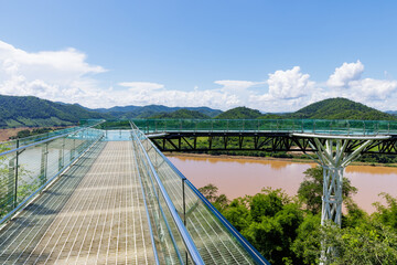 A beautiful bridge or glass skywalk over Mekong river, a tourist destination located between Thailand and Laos PDR at Chiang Khan, Loei Province