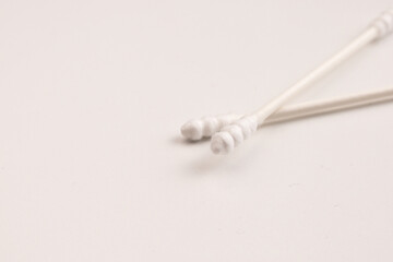 Cotton Buds Resting on White Background for Hygiene Concept