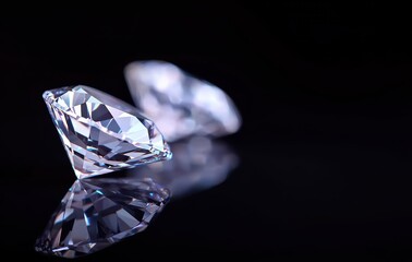 Brilliant Cut Diamonds Reflecting Light on Black Surface
