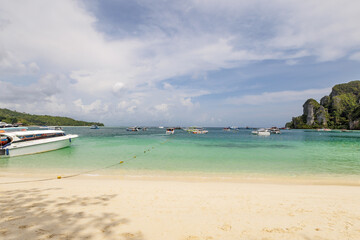Beautiful crystal clear water on the beach at a very popular tourist destination, Phi Phi Islands, Krabi, Southern of Thailand, on May 13,2022 in Phi Phi National Park, Krabi Province Thailand