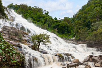 Landscape nature Mae ya waterfall in mountain Chiang mai Thailand located within the area of Doi Inthanon National Park. A popular destination for tourist in Chiangmai province, Northern of Thailand
