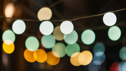 Warm glowing string lights create a magical bokeh effect perfect for festive celebrations and cozy atmospheres