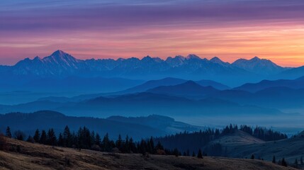 Obraz premium Majestic mountain range sunrise panorama