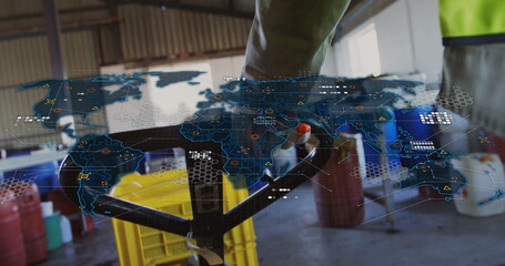 Operating warehouse worker in safety vest pushing yellow crates on pallet jack, world map overlay