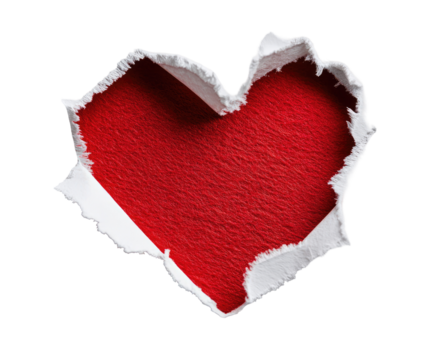 A red heart shape, punched out of white paper, on a black background