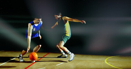 Dribbling basketball blue jersey 16 navigating around defender at gym court lines, copy space