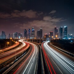 Obraz premium Dynamic night traffic with colorful car light trails on city highway