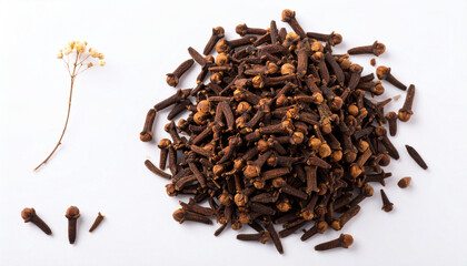 Aromatic pile of whole dried clove spice buds, a popular culinary ingredient for cooking and seasoning, isolated on a white background