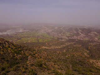 Rolling Hills and Green Fields in Cyprus with Winding Dirt Roads