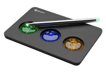 Matte black synthetic tablet, three glowing multi-color liquids, glowing metallic stylus on transparent background, subtle shadow, copy space. Concept of scientific precision
