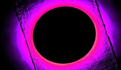Unique circular black hole with vibrant purple light effects creating a dramatic visual experience