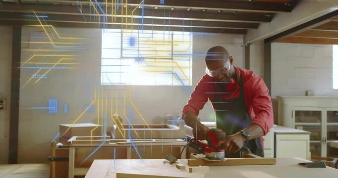 Woodworker powering on sander and activating digital overlay while smoothing panel for finishing