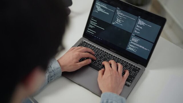 Coding on a futuristic interface.
