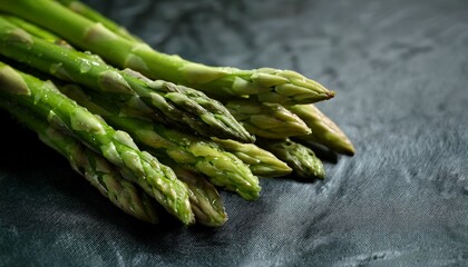 close up of fresh green asparagus spears highlighting detailed tips and vibrant color healthy organic vegetable raw produce nutritious food farm fresh food photography natural vegetarian vega