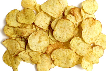 There are two slices of sliced ​​orange on a pink background.