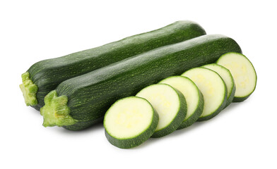 Whole and cut fresh zucchinis isolated on white