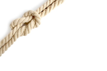 A twisting rope lies on a white background.	