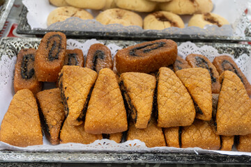 North African sweet desserts on weekly food market in Toulouse, France