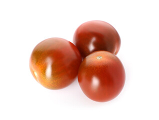Three ripe juicy tomatoes isolated on white