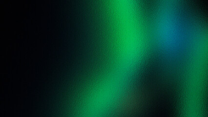 Abstract shimmering green and blue aurora borealis light streaks on a dark background