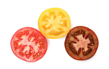 Pieces of different ripe juicy tomatoes isolated on white, top view
