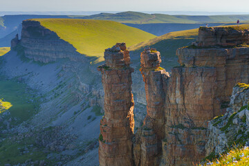 A panoramic aerial view of the Two Monks rock on the Bolshoy Bermamyt plateau, North Caucasus,...