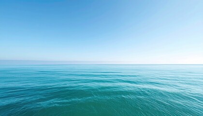 Obraz premium Tranquil expanse of ocean, vast azure sky