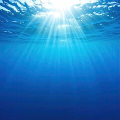 Obraz premium Sunlight beams through deep, vibrant blue ocean water