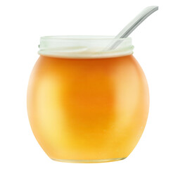 Open glass jar of honey with a spoon isolated on white background