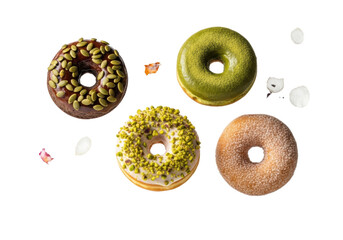 Floating gourmet donuts: dark rye with pumpkin seeds, matcha, vanilla bean with pistachios, multi-grain, on a transparent background with soft shadows, natural indulgence concept