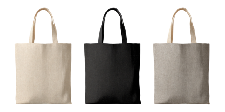Three blank canvas tote bags in cream, black, and gray