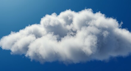 Obraz premium Fluffy cumulus cloud against blue sky