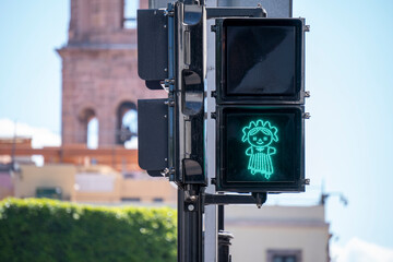 Unique Traffic Lights in Queretaro City, Mexico. Stepping girl called Queretana is a feature of...