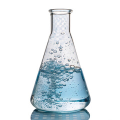 Clear erlenmeyer flask filled with blue liquid and bubbles on a reflective surface against black