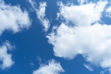 Obraz premium Blue sky with white clouds. Daytime sky. Background, overlay. High quality photo