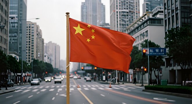 A vibrant flag waving proudly in a city street, representing the nation against the backdrop of modern buildings. The flag has five yellow stars