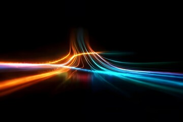  Streaks of light in motion against a dark background, creating a speed effect and a futuristic technology concept.
