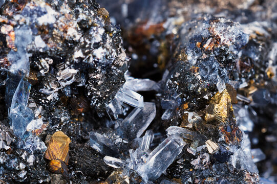 mineral specimen, rock crystal quartz and alena with iridescent golden yellow pyrite crystals, abstract texture