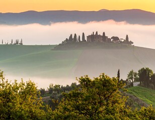 Misty Tuscan hills at sunrise