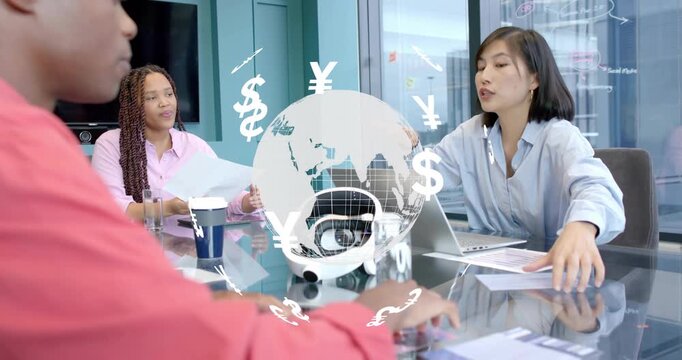 Korean presenter opening laptop and pointing at rotating finance globe with currency icons on table