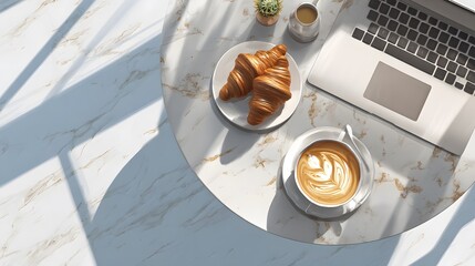 Flat lay of croissants coffee and laptop on marble table for freelance work and breakfast concept
