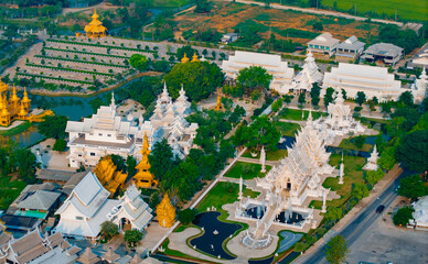 Obraz premium Aerial view of wat rong khun white temple complex in Chiang Rai, Thailand