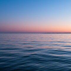 Obraz premium Peaceful Sunset Over Calm Ocean Water